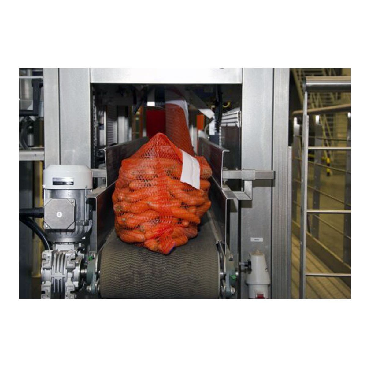 Автоматический упаковщик в сетку-мешок на рулоне AR25